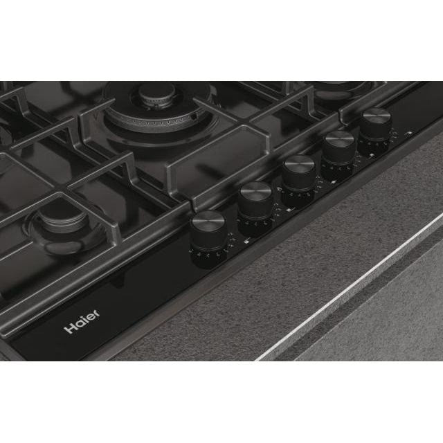 Plita incorporabila Haier HAHG7W5HEB, Gaz, 5 Arzatoare, Grilaje fonta (x3), Aprindere electrica, Preci Flame – reglarea in 9 trepte a flacarii, 75 cm, Email cu sticla neagra